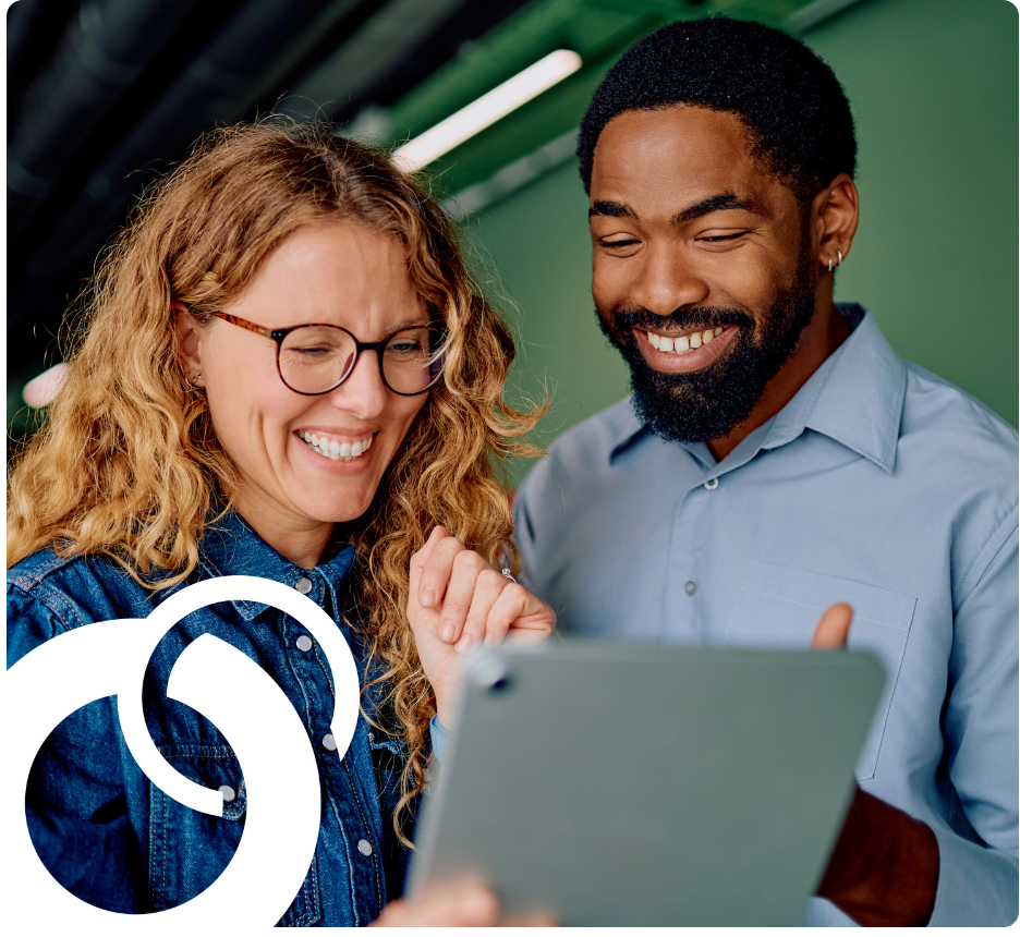 Smiling colleagues working on a absence and ancillary benefits program